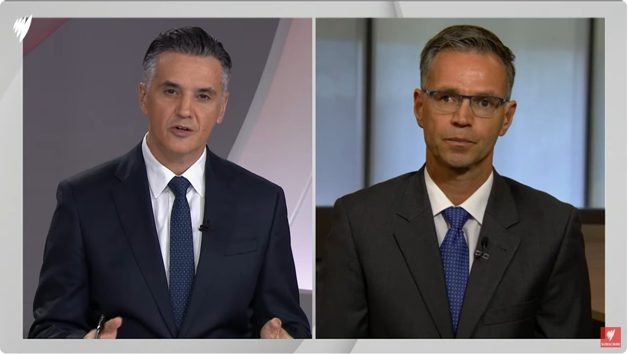 markus wagner and ricardo goncalves on screen on SBS World News